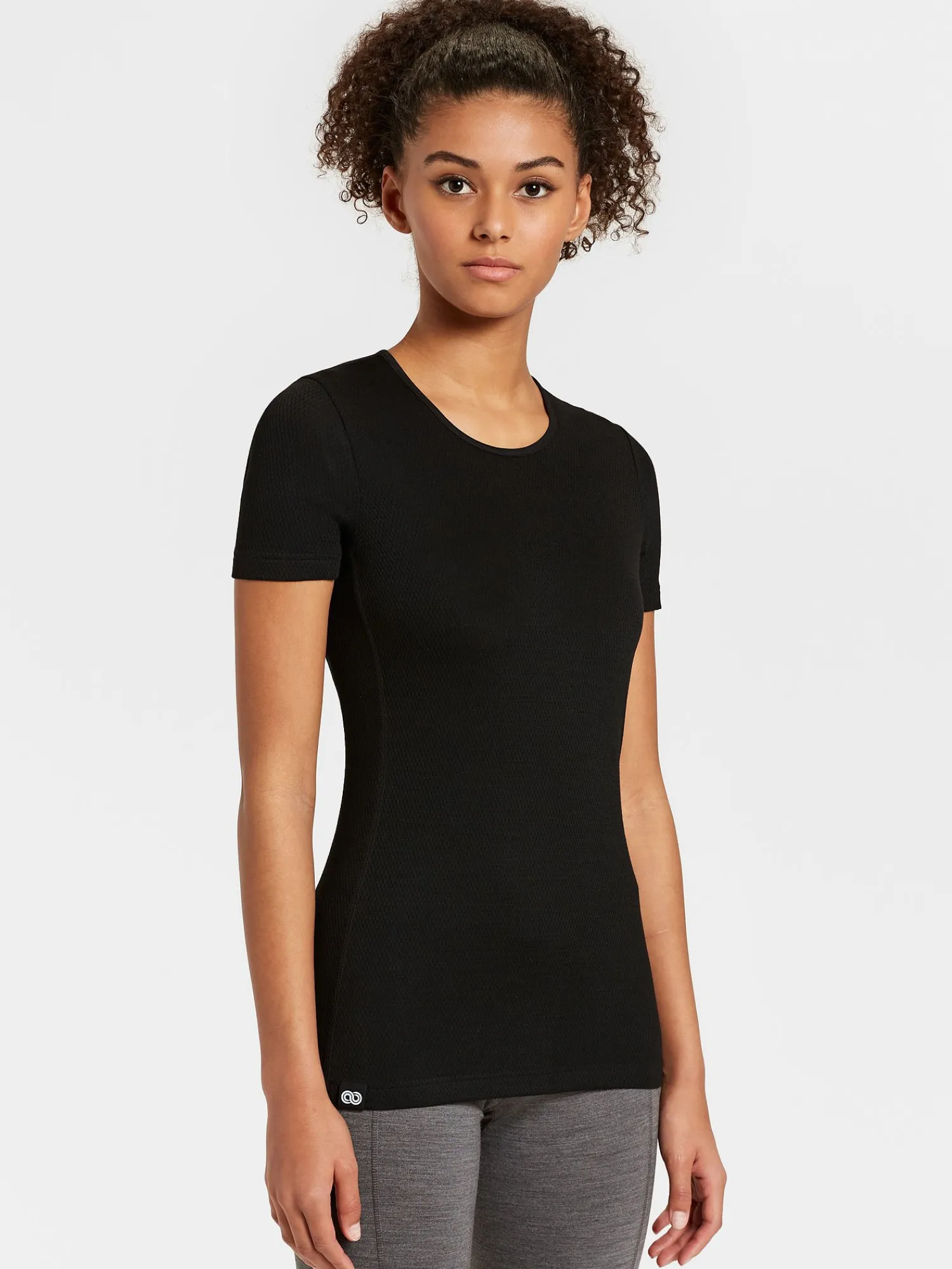 Best Rewoolution SKIN - t-shirt in merino mesh 180 gr per donna in colore nero